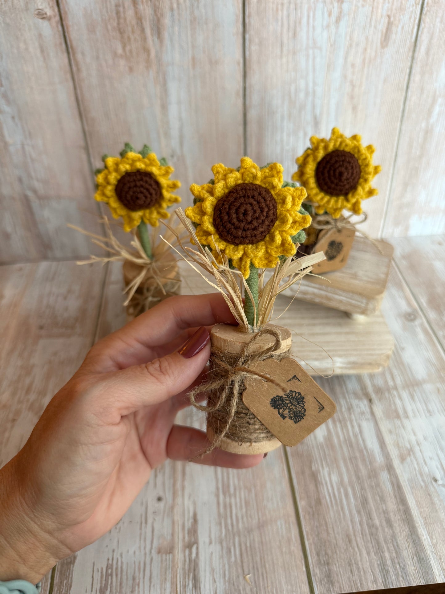 Rustic Crochet Sunflower Arrangement in Wooden Spool Vase, Handcrafted Sunflower Ornament, Crochet Flower in Twine Wrapped Spool, Farmhouse Style Crochet Sunflower with Wooden Spool Base, Boho Rustic Crochet Sunflower Tabletop Decoration