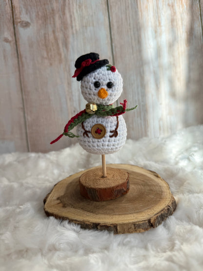Crochet Snowman on Wood Stand Handmade Winter Decor, Handmade Crochet Snowman with Hat & Scarf Christmas Table Decoration, Amigurumi Snowman Ornament Cozy Winter Home Accent, Crochet Snowman Figurine Rustic Holiday Decor on Wooden Base