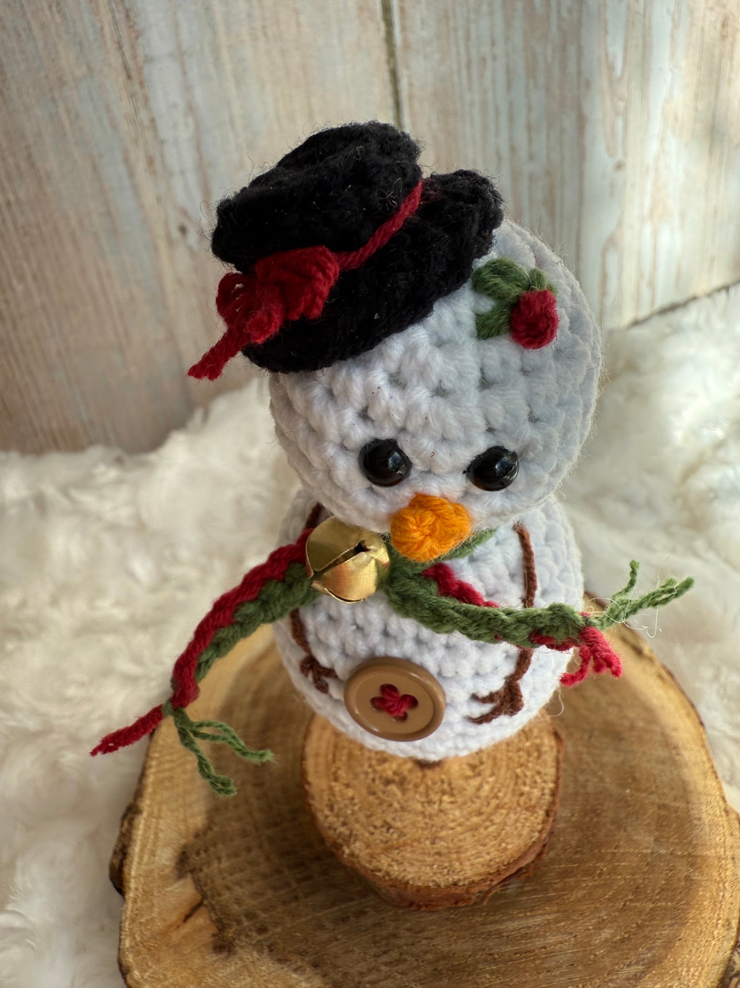 Crochet Snowman on Wood Stand Handmade Winter Decor, Handmade Crochet Snowman with Hat & Scarf Christmas Table Decoration, Amigurumi Snowman Ornament Cozy Winter Home Accent, Crochet Snowman Figurine Rustic Holiday Decor on Wooden Base