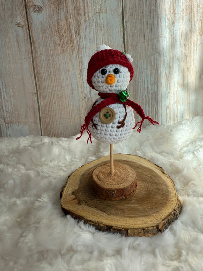 Crochet Snowman on Wood Stand Handmade Winter Decor, Handmade Crochet Snowman with Hat & Scarf Christmas Table Decoration, Amigurumi Snowman Ornament Cozy Winter Home Accent, Crochet Snowman Figurine Rustic Holiday Decor on Wooden Base