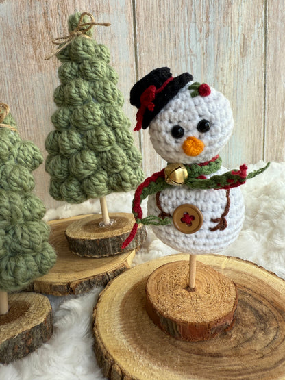 Crochet Snowman on Wood Stand Handmade Winter Decor, Handmade Crochet Snowman with Hat & Scarf Christmas Table Decoration, Amigurumi Snowman Ornament Cozy Winter Home Accent, Crochet Snowman Figurine Rustic Holiday Decor on Wooden Base